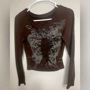 Chocolate brown cropped long sleeve tee with angel wings graphic
